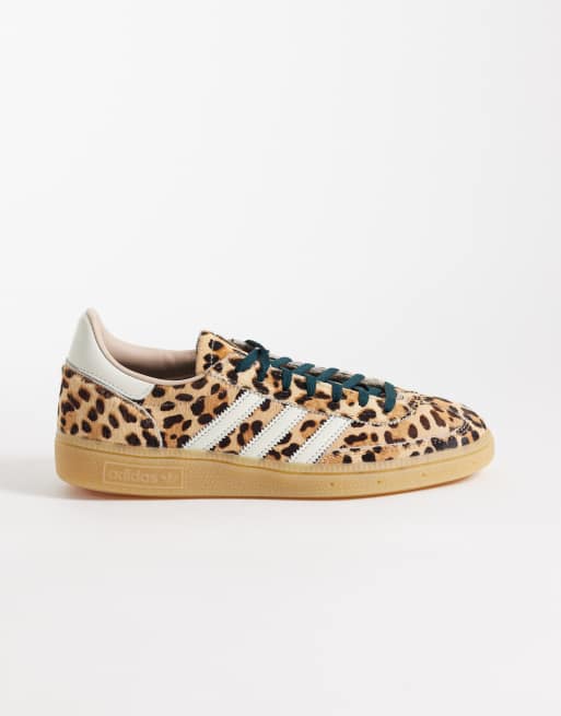 adidas Originals Handball Spezial trainers in leopard print with gum sole
